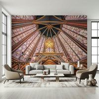Lounge area dressed in radiant Gothic wall mural with ornate arches and glass