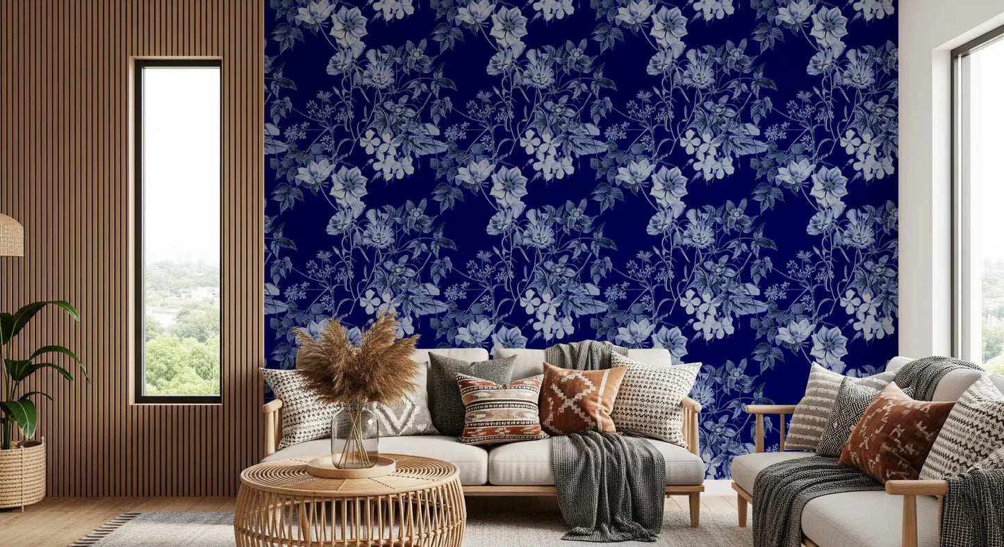 Vintage blue wallpaper with engraved flowers and layered leafy branches