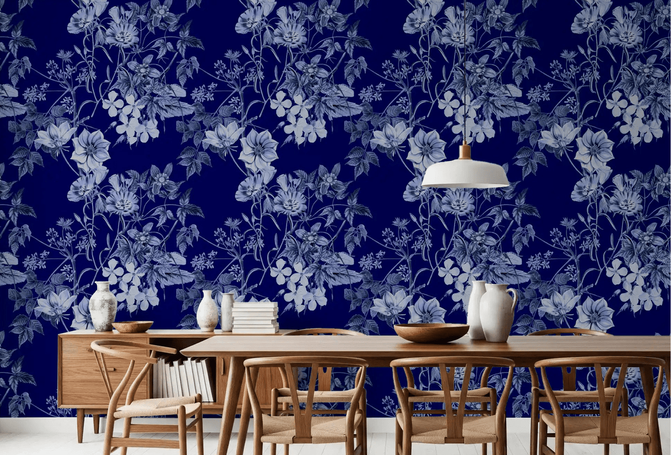 Midnight floral wallpaper with soft blue blossoms and engraved botanical detailing
