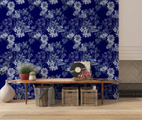 Botanical wallpaper in navy and powder blue with classic floral linework