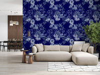 Living room styled in Grabados Flor de Medianoche wallpaper with pale botanical blooms