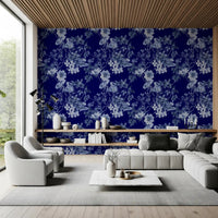 Midnight botanical wallpaper with pale blue florals and intricate stem pattern