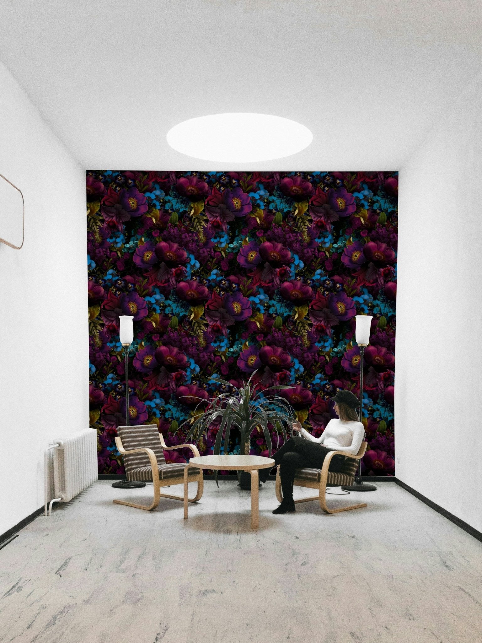 Bedroom decorated with moody floral wallpaper

