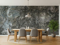 Granite Depths wallpaper mural behind a leather sofa.