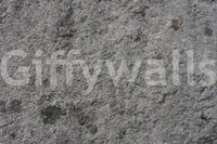 Corner view of gray peel and stick feature wall.