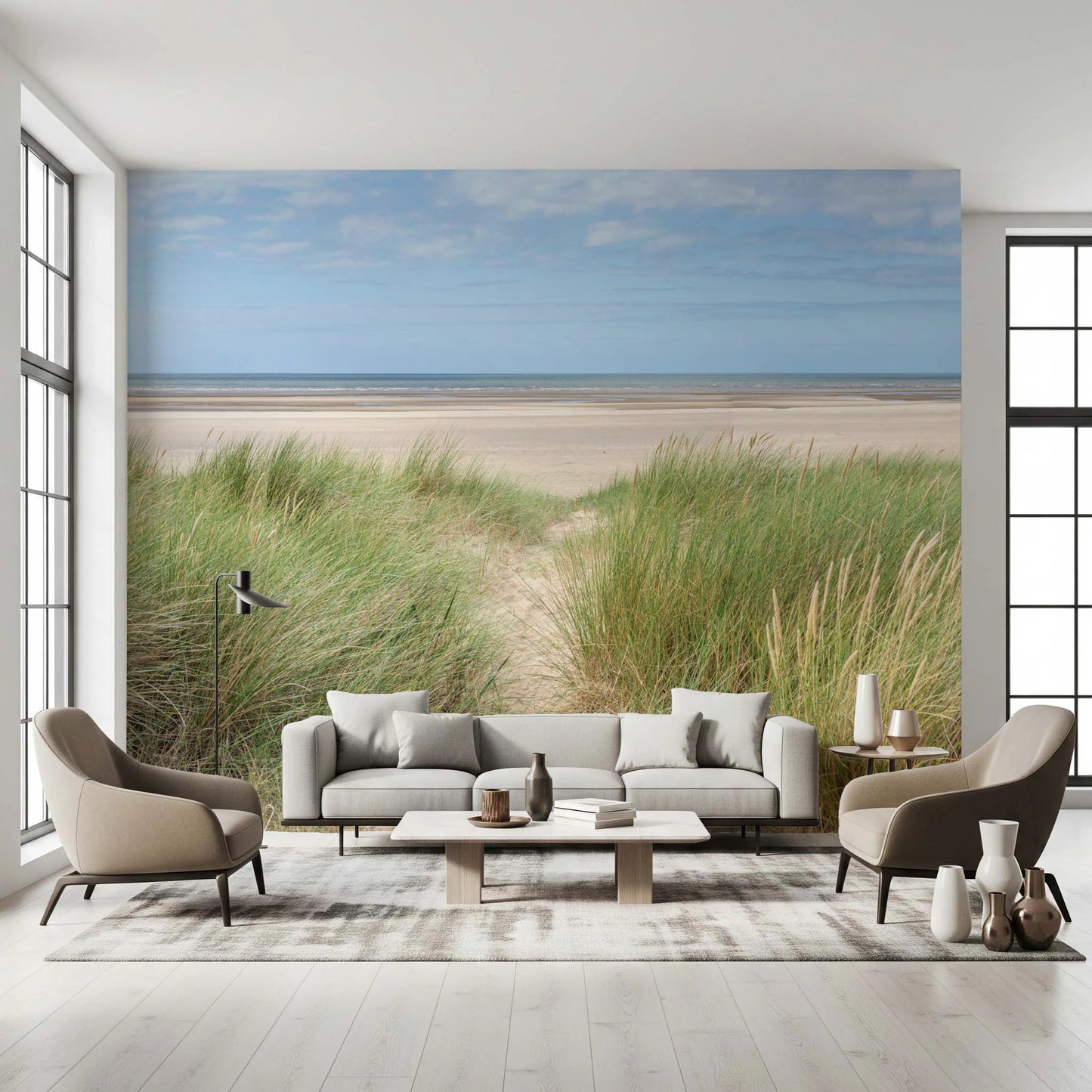 This airy living room uses Grassland by the Sea Wall Mural for a soft coastal backdrop