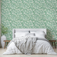 Light green background with floral leaf pattern

