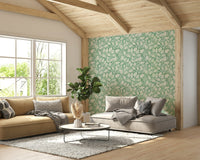 Subtle green wallpaper with leaf motifs

