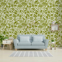 Green flower shapes wallpaper on a wall

