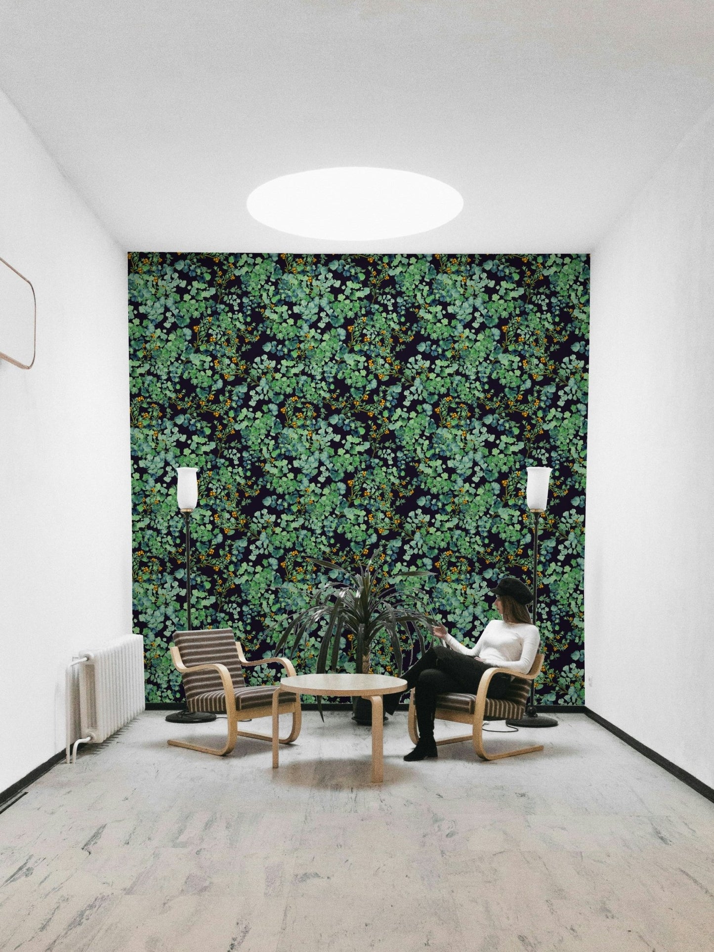 Wallpaper with a green leafy pattern.
