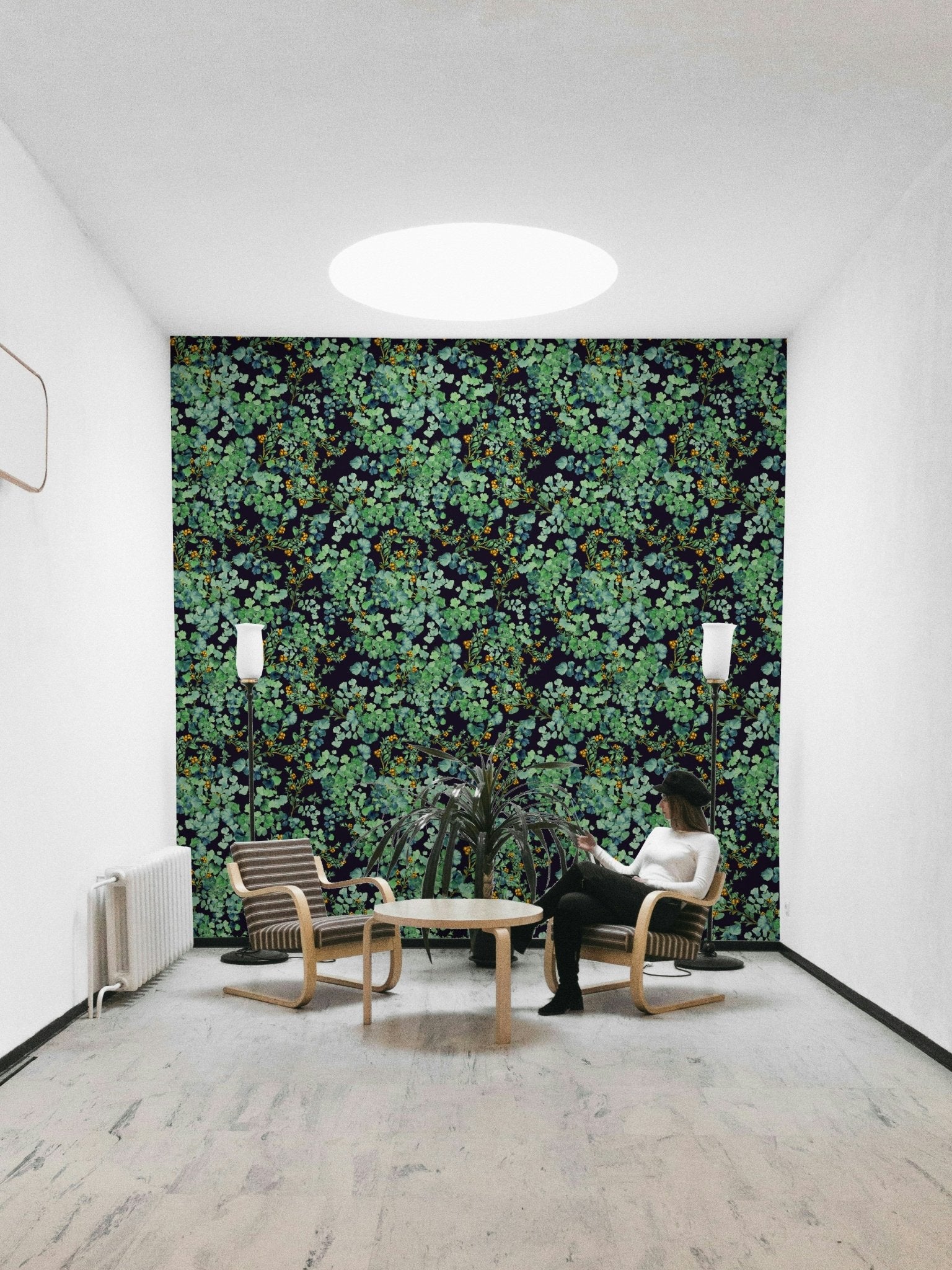 Wallpaper with a green leafy pattern.
