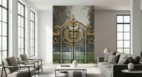 Historic gate design wallpaper with green foliage for a hallway wall mural.