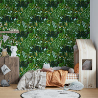 Green tropical wallpaper for a bathroom.
