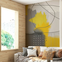 Elegant gold accents on grey wallpaper

