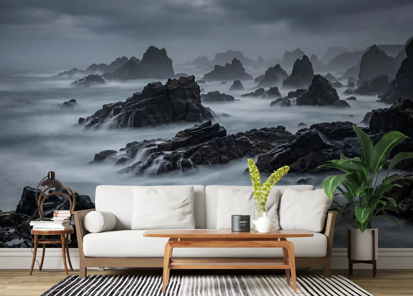 A quiet living room paired with the moody Grey Coast Mystique wall mural on the back 