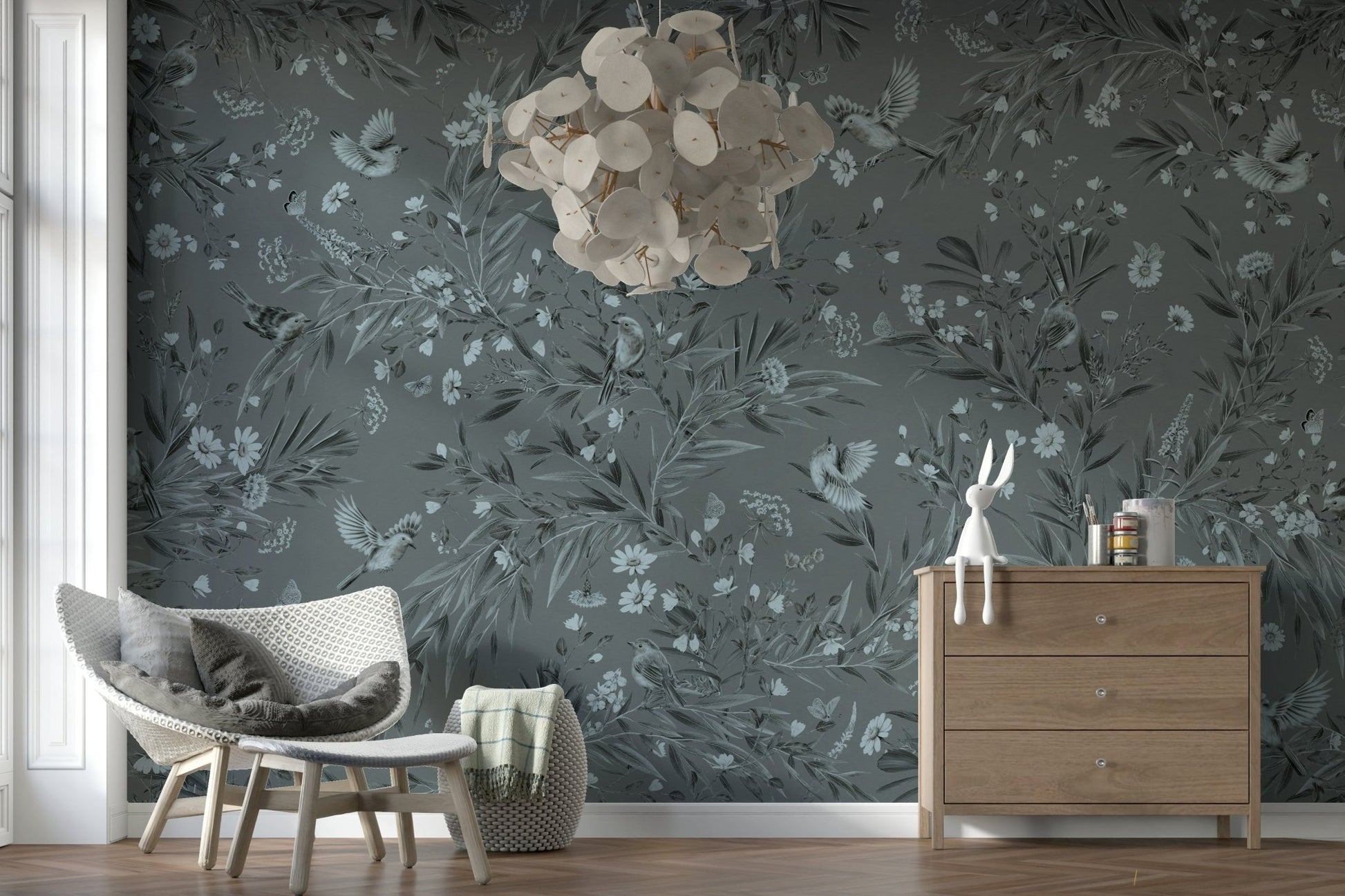 Grey Floral Aviary Wall Mural behind a stylish sofa.