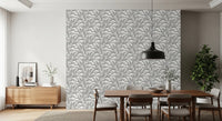 Grey botanical wallpaper with flowing canopy leaves and open spacing