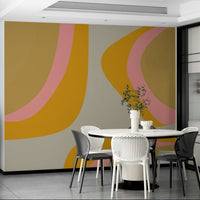 Vintage groovy mural in bold orange, pink, and yellow

