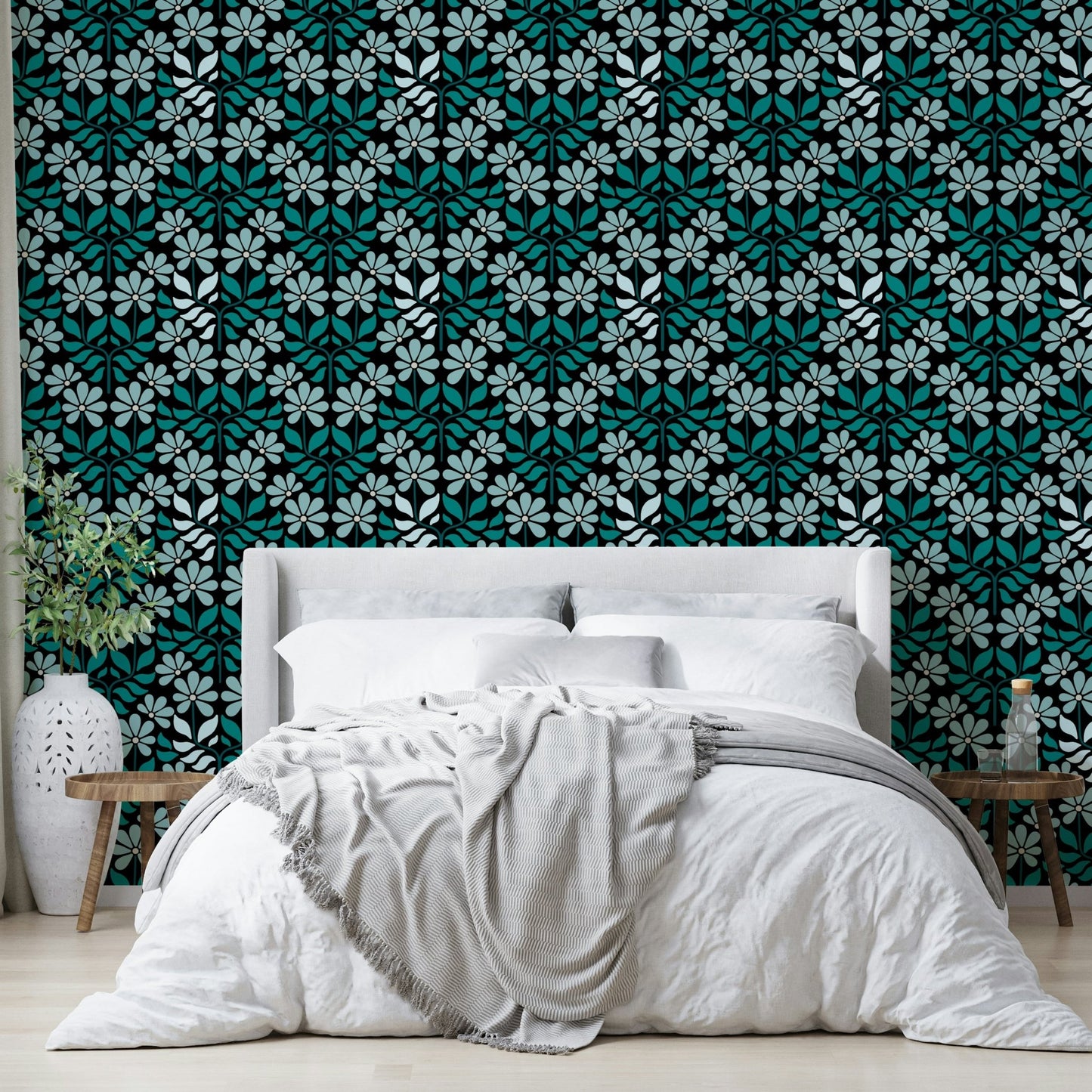 Soft blue wallpaper with bold flower prints

