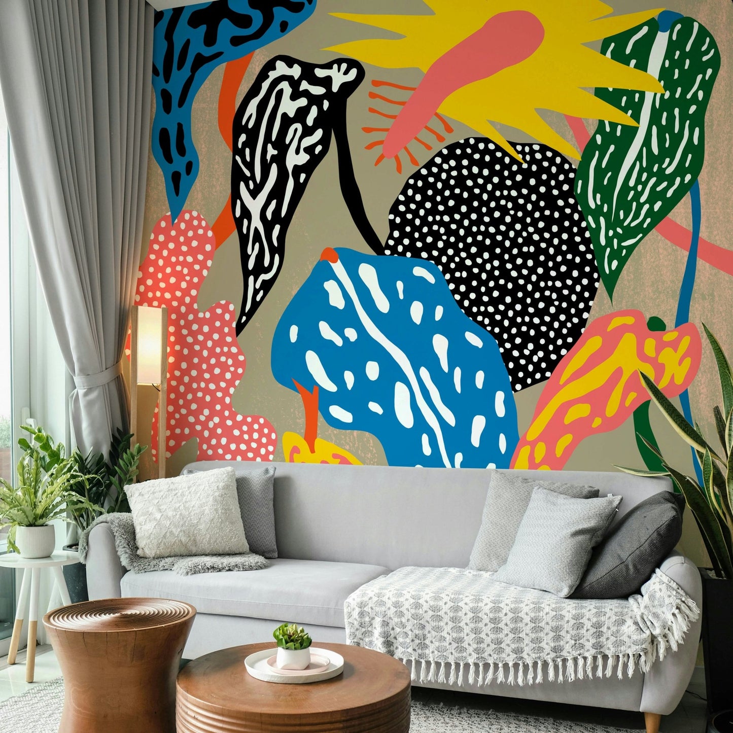 Bright mural wallpaper with jungle-inspired shapes