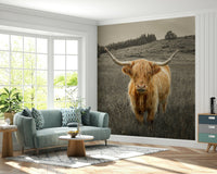 Shaggy Highland cow wall mural in a country style bedroom interior.