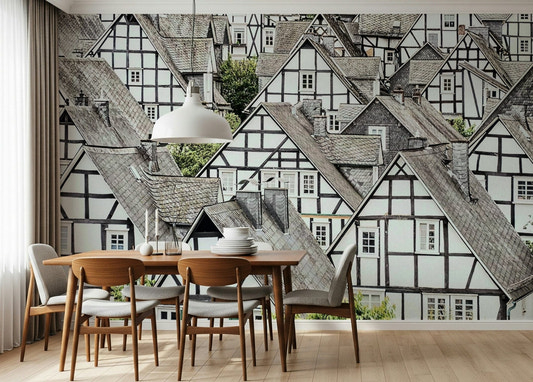 A warm dining room styled with Half-Timbered Haven Wall Mural and layered village roofs