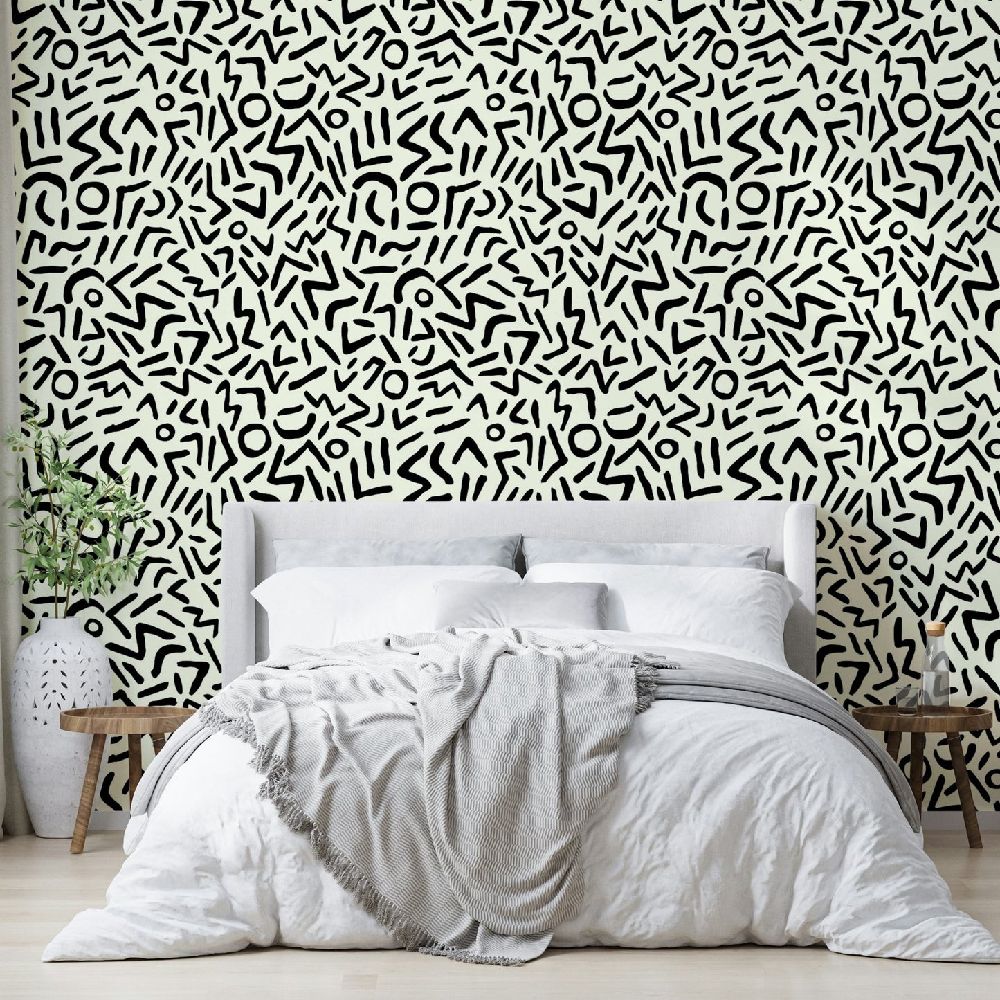 Hand drawn abstract tribal wallpaper on a living room wall

