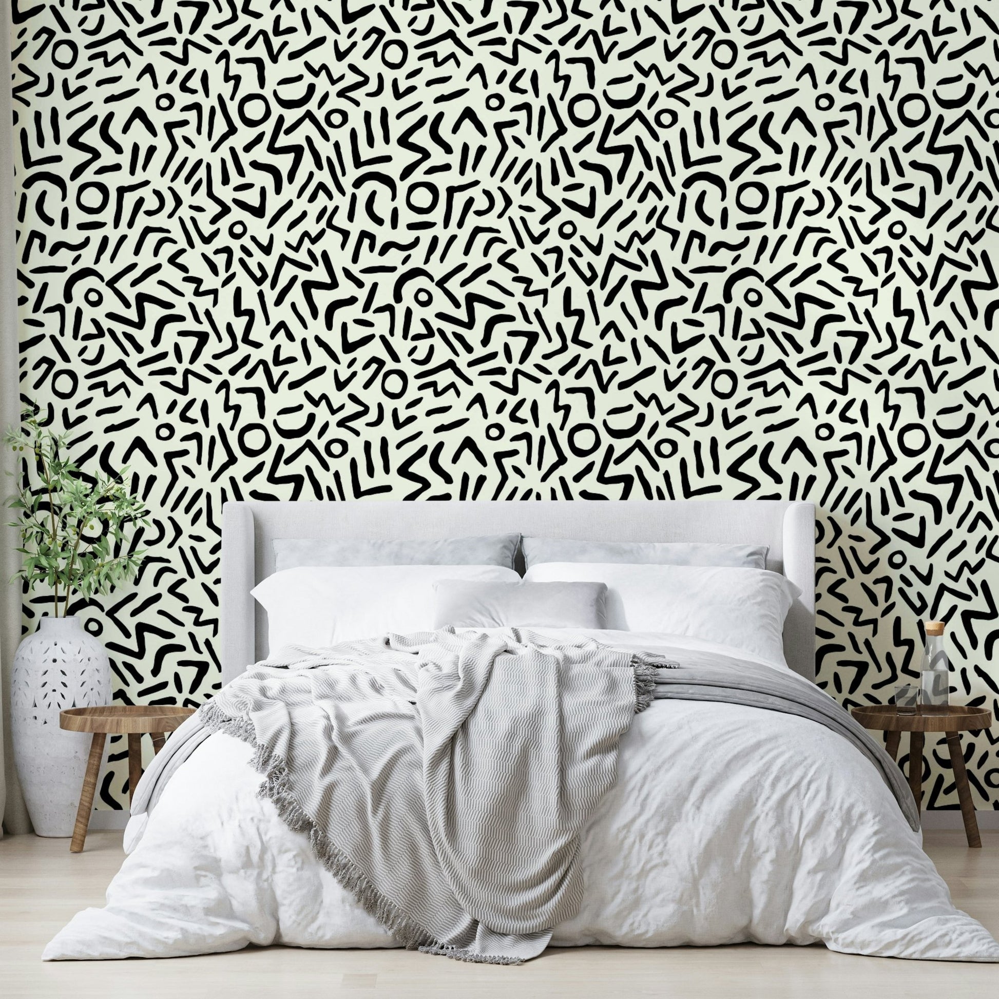 Hand drawn abstract tribal wallpaper on a living room wall

