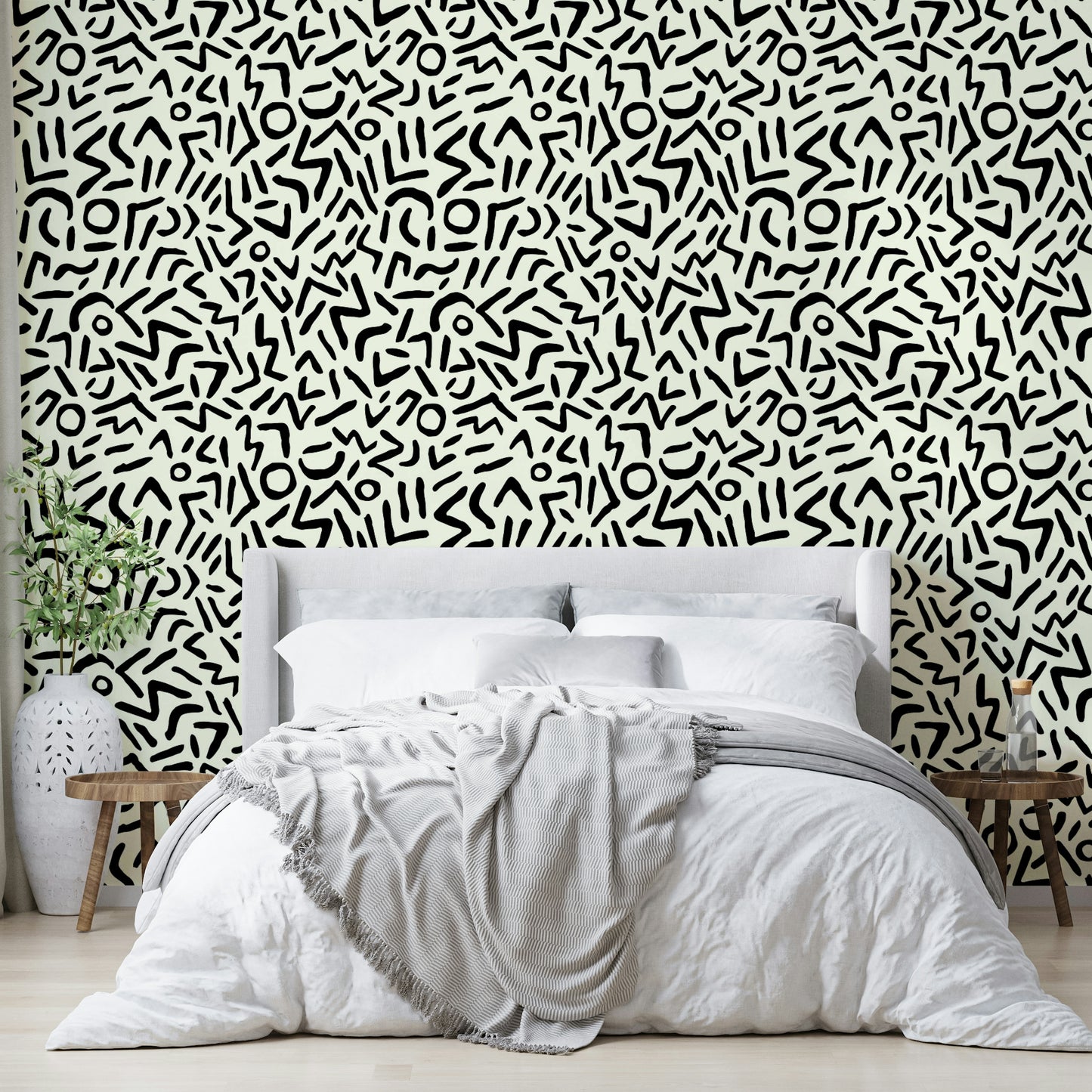 Hand drawn abstract tribal wallpaper on a living room wall

