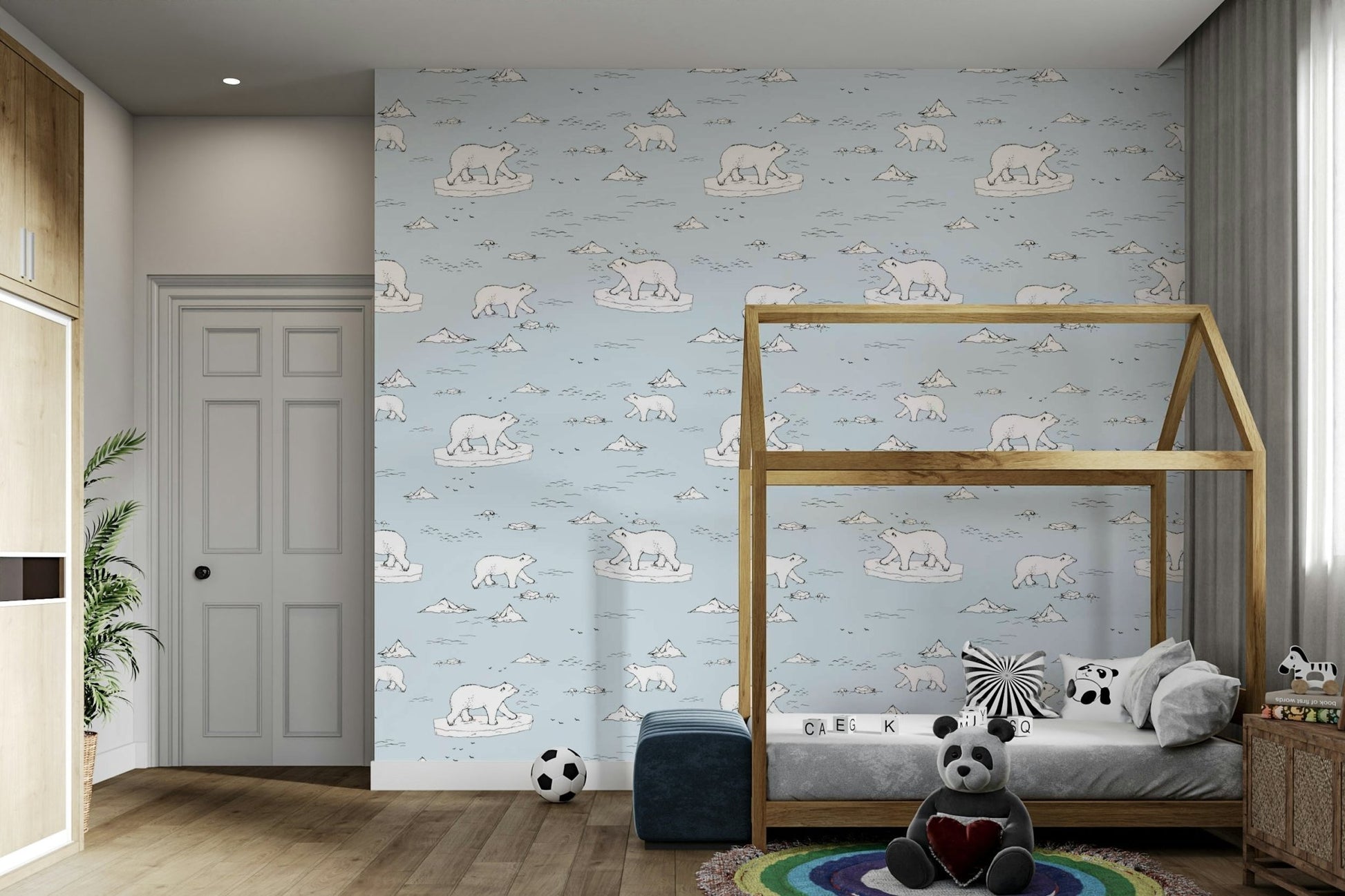 An angled shot of a wall with polar bear wallpaper

