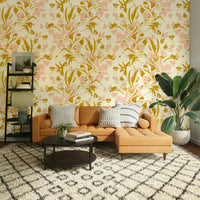 A dining area decorated with a painted floral mural

