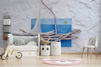 An artistic driftwood vessel mural on minimalist wallpaper.


