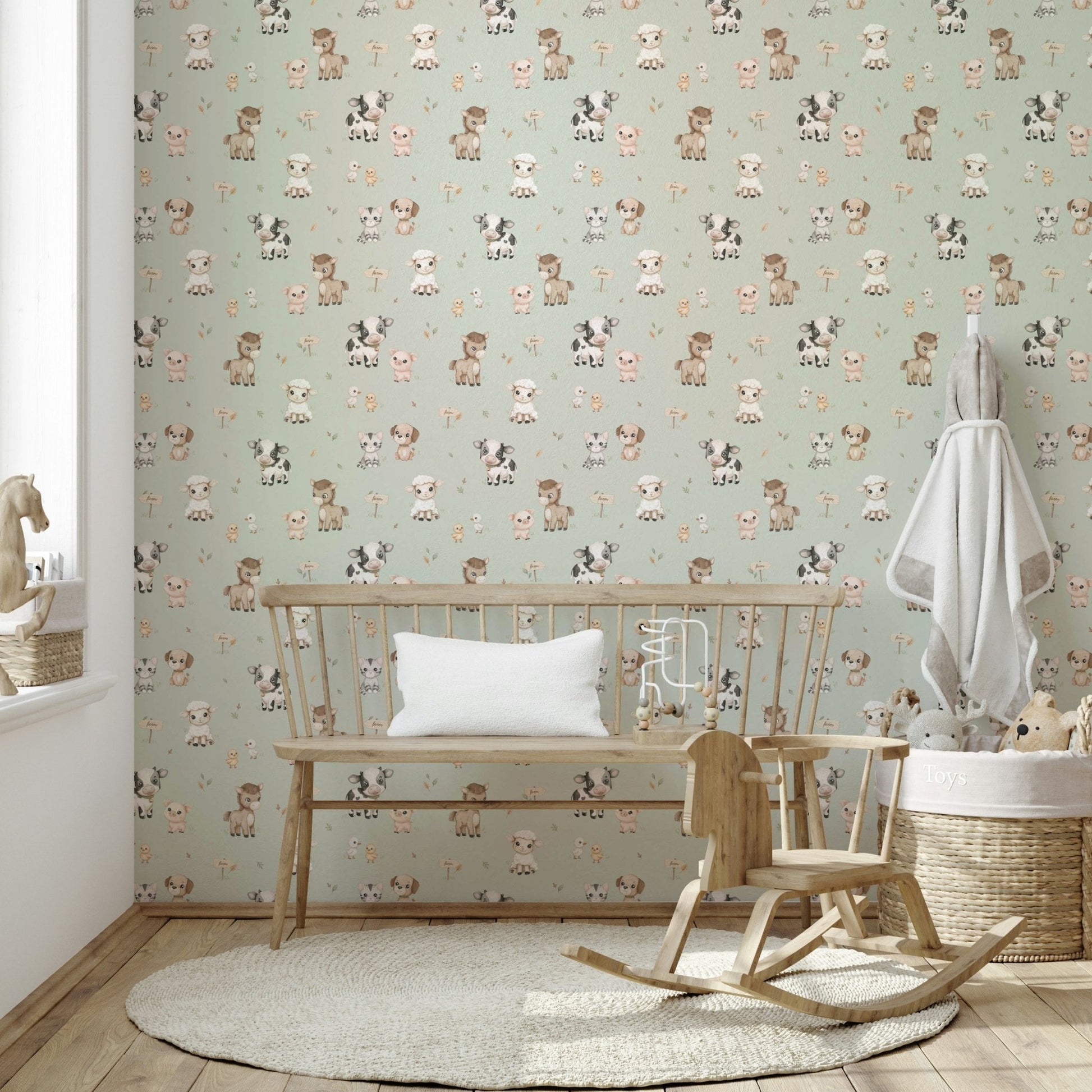 Playful farm animals on mint wallpaper for children’s room

