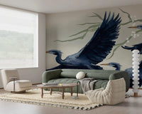 Lounge corner where Heron Flight Wall Mural flows with soft seating