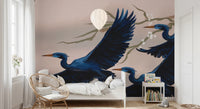 Relaxed seating area complemented by Heron’s Bloom Wall Mural and light décor