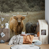 Cozy Highland cow mural for a nature-inspired room.

