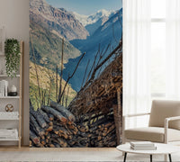 Rustic firewood and mountain range wall mural.