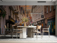 Timeless mural of cobbled streets and warm skies.

