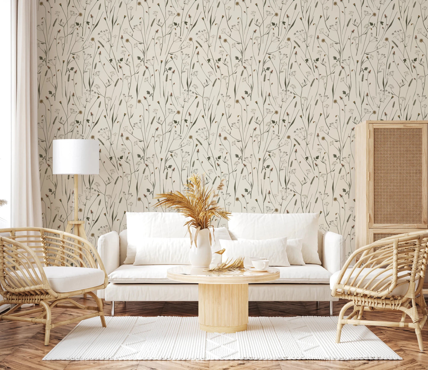 The lounge feels light and easy with Homeland Floral Muted Wallpaper in the background