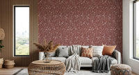 Bedroom styled with Homeland Floral Terracotta Wallpaper and soft neutral decor