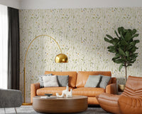 Homeland Floral Wallpaper adds softness behind the sofa in this relaxed sitting space