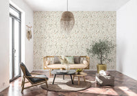 Living room feels lighter with this delicate floral wallpaper behind it