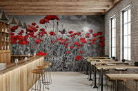 Wall mural of red poppies in sunny field

