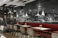 Monochrome Manhattan skyline mural with Little Island design

