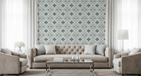 White sofa set against Indigo Bloom Tiles Wallpaper in a soft airy lounge