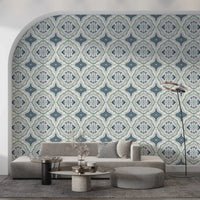 Gray sofa lounge styled with Indigo Bloom Tiles Wallpaper and soft blue tile pattern