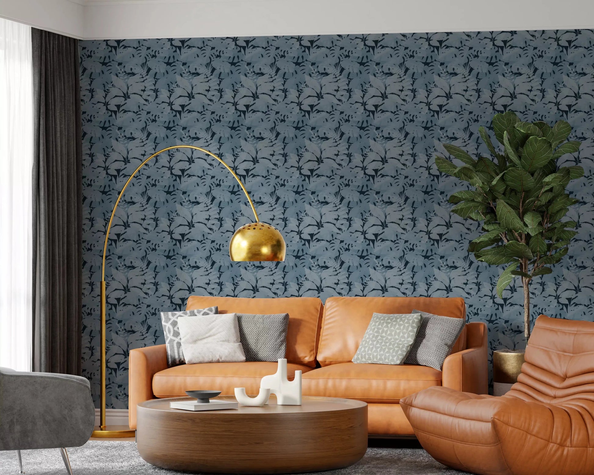 Rust sofa corner paired with Indigo Botanical Monstera Leaves Wallpaper