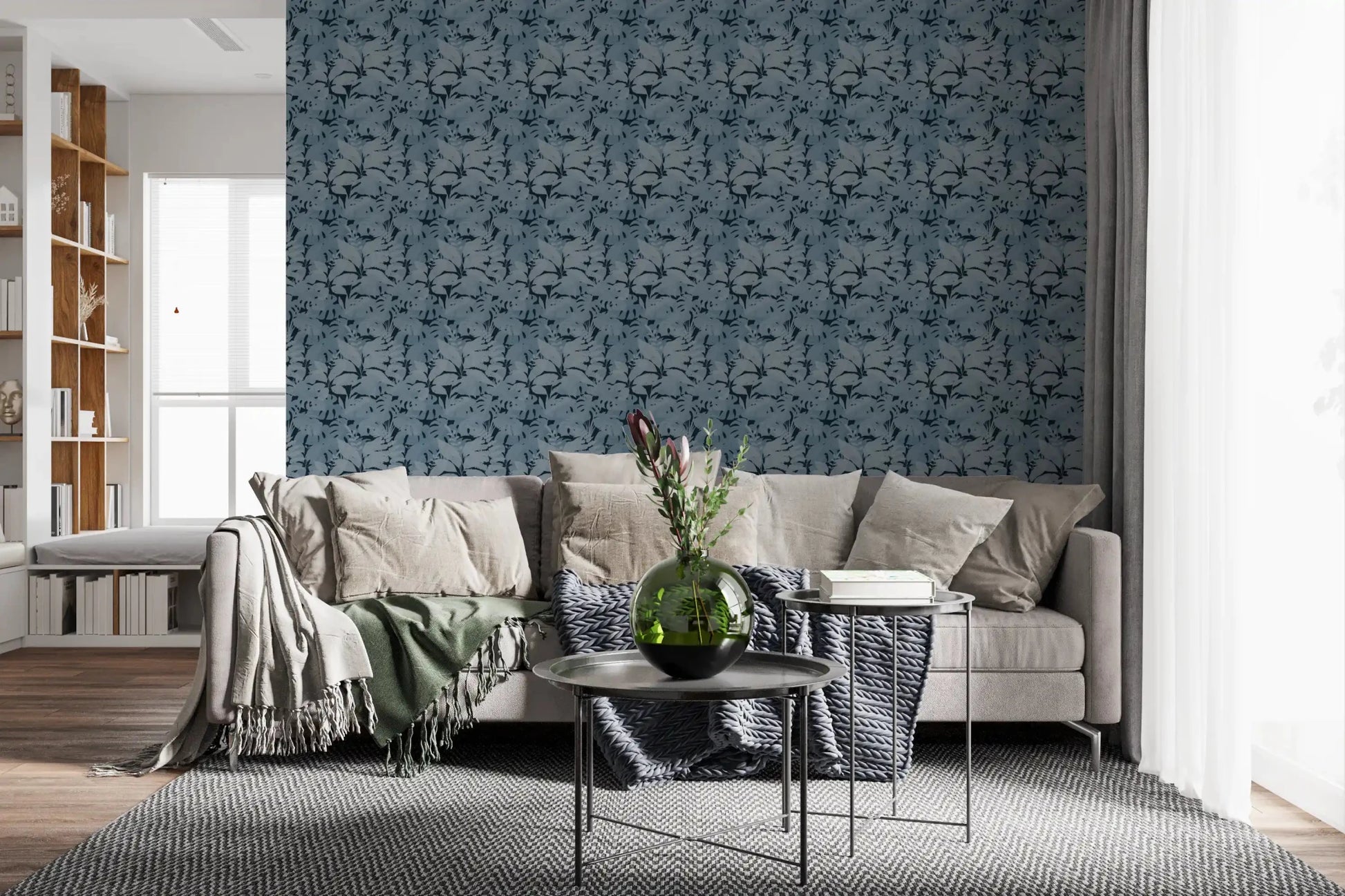 Dark bed backdrop with Indigo Botanical Monstera Leaves Wallpaper in a calm Livning room 