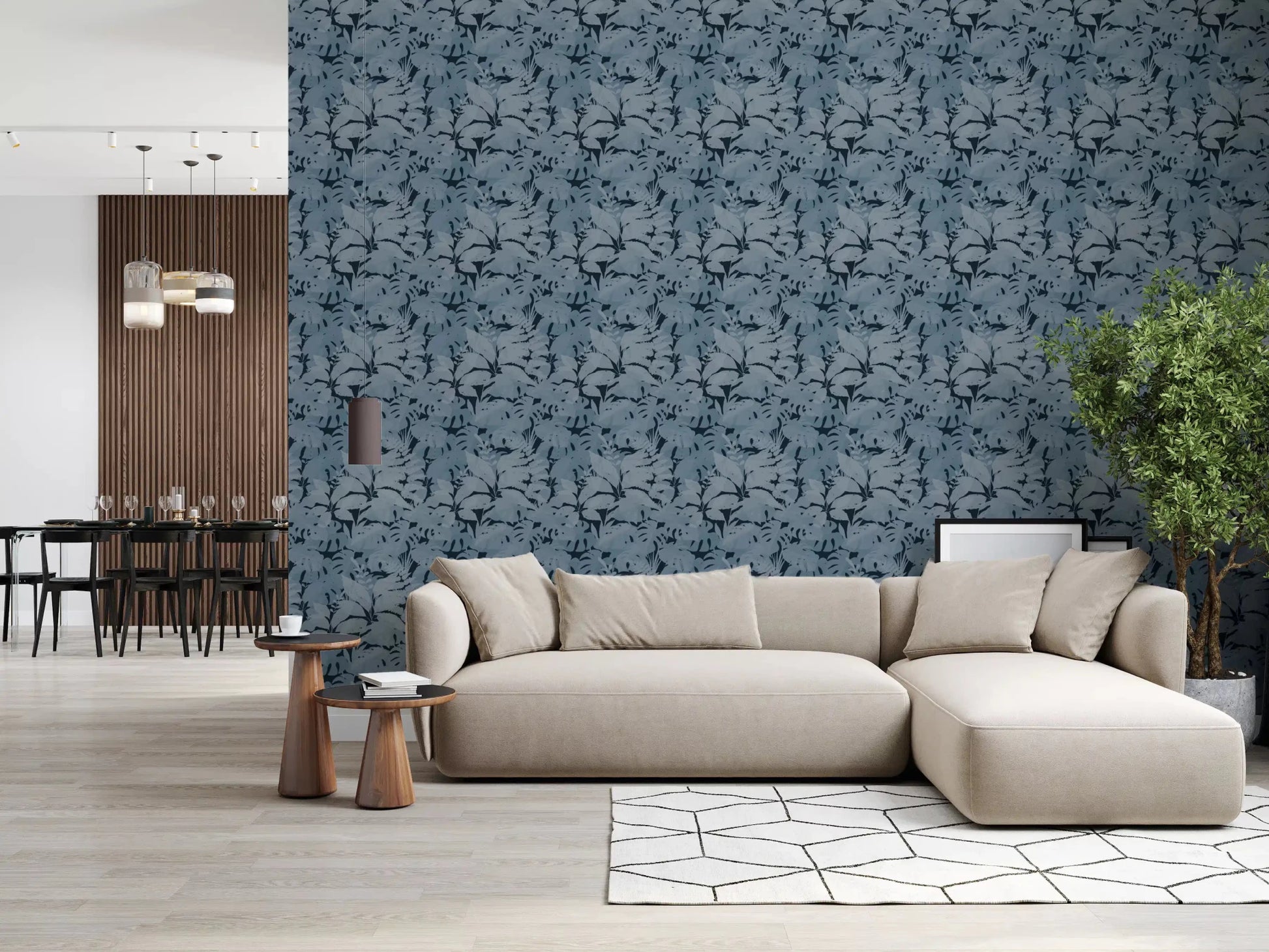 Indigo Botanical Monstera Leaves Wallpaper framing a soft neutral living room