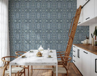 Sinuous navy curves define Indigo Flow peel and stick wallpaper.